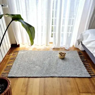 small light grey rug