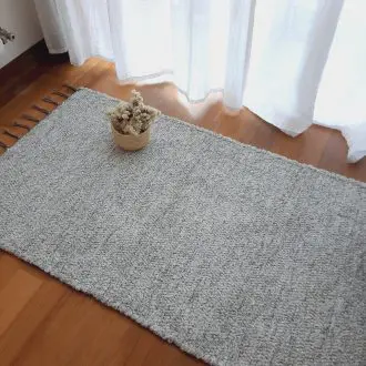 small white and grey cotton rug