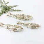 Glazed Cream Stone Sardines Wall Decor