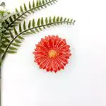 red ceramic flower