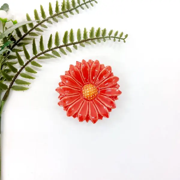 red ceramic flower