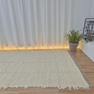 extra large cream rug with tassels