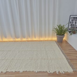 extra large cream rug with tassels