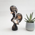 black and gold ceramic rooster