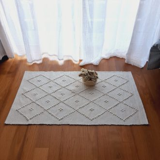 white knotted rug