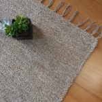 Small light brown rug