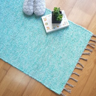 Small water green rug