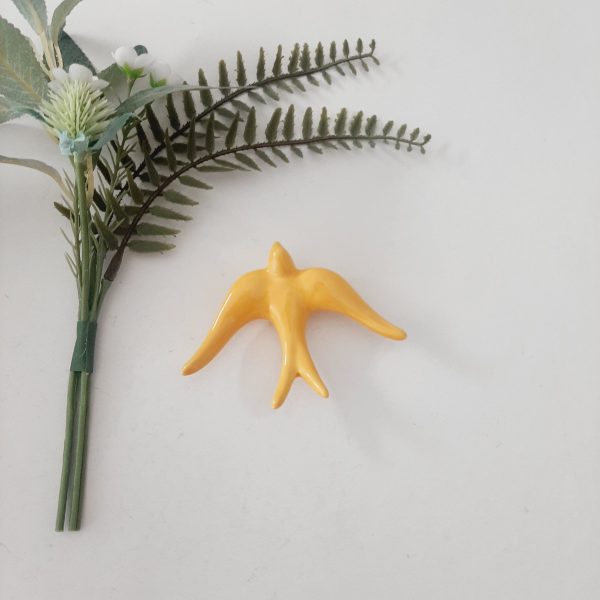 andorinha amarela vidrada pequena