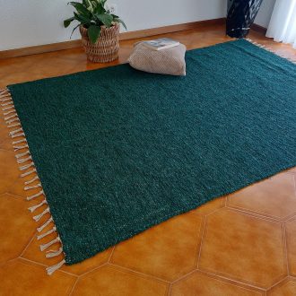 Large dark green rug