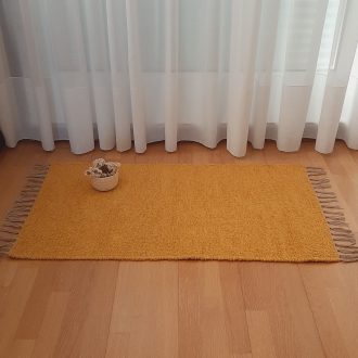 Small mustard yellow rug