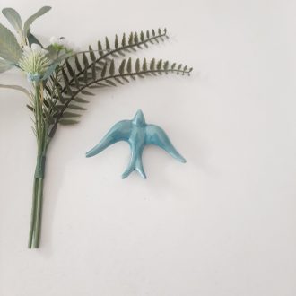 andorinha azul-petróleo vidrada pequena