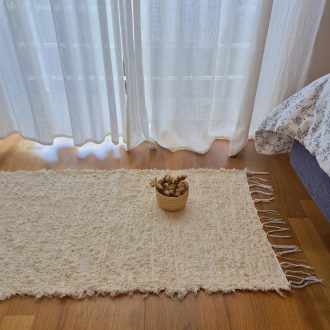 small cream rug