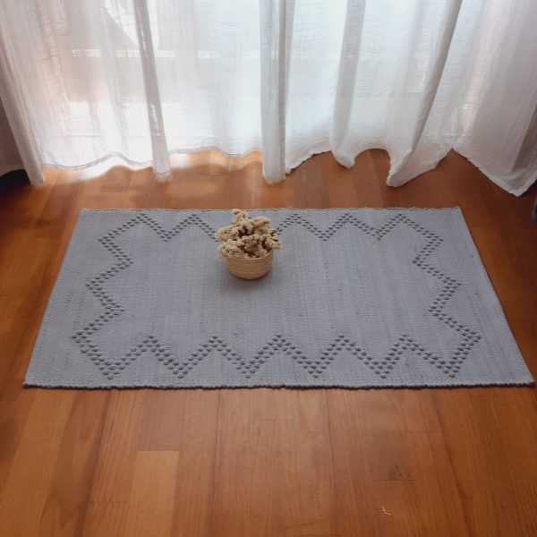 tapete cinzento artesanal