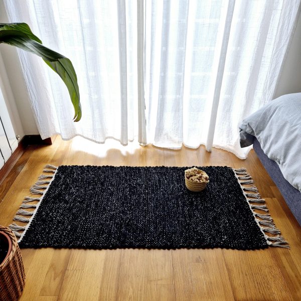 black rug with silver glitter