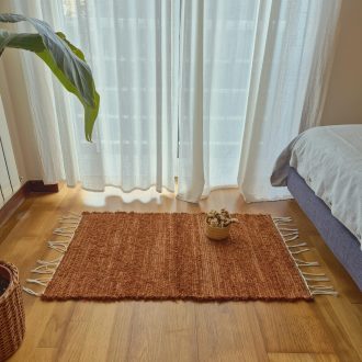 small brown rug handwoven