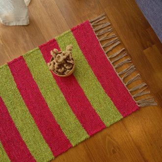 pink and green striped rug