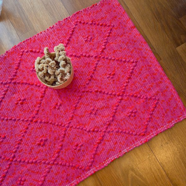 pink and orange cotton rug