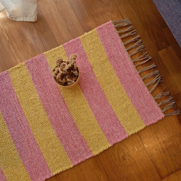 pink and yellow rug hand woven rug