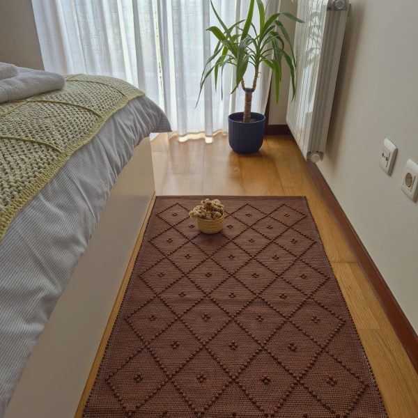 brown area bedroom rug in cotton