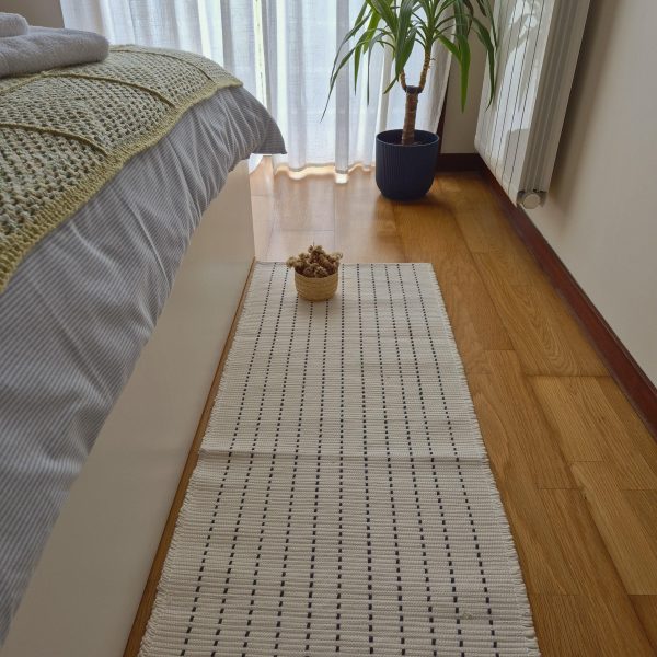 ecru runner with black stripes lines