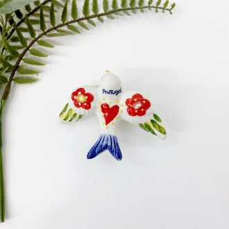 Ceramic swallow with flowers