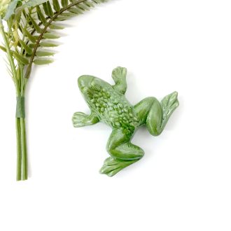 green ceramic frog