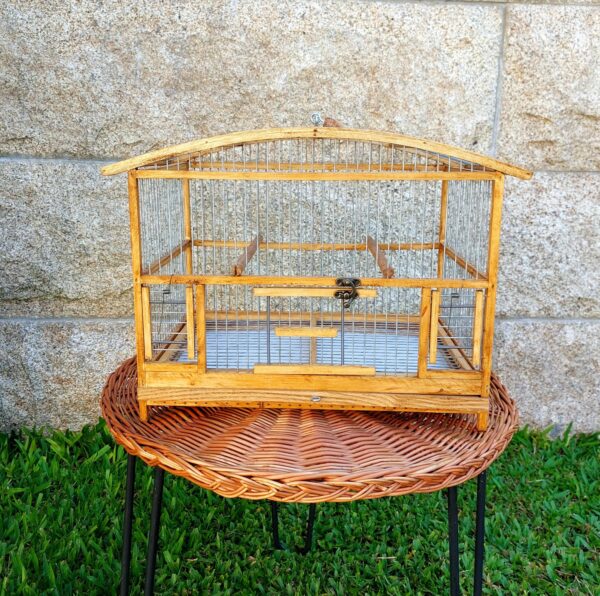 small curved bird cage