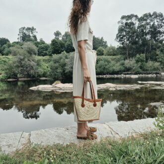 straw handbag with leather trim