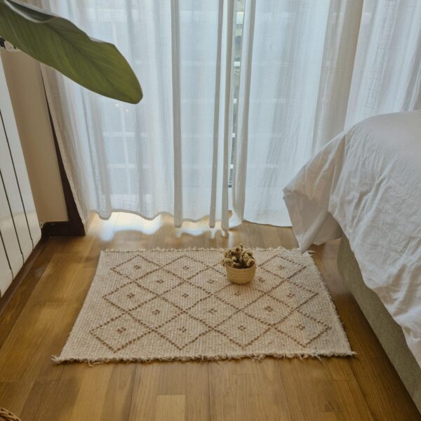 mini pastel pink and cream rug with dots